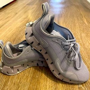 Reebok Women’s Size 6.5. NEW without box. Never worn. Mauve purple color.